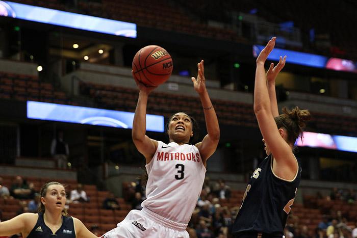 Senior Janae Sharpe fights her way up to the basket for the Matadors in their semifinal game against UC Davis on March 13. The Matadors defeated the Aggies 61-47. (Trevor Stamp / Multimedia Editor)