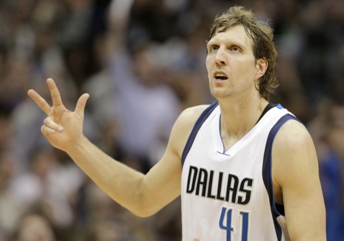 Nowitzki+snatched+his+10%2C000th+rebound+after+a+missed+corner+3-point+attempt+by+San+Antonio%E2%80%99s+Manu+Ginobili+in+Tuesday+evening%E2%80%99s+game+at+home+in+the+American+Airlines+Center.+The+fans+were+awarded+that+night+with+a+101-+94+victory+and+a+little+taste+of+history.+Photo+courtesy+of+TNS.
