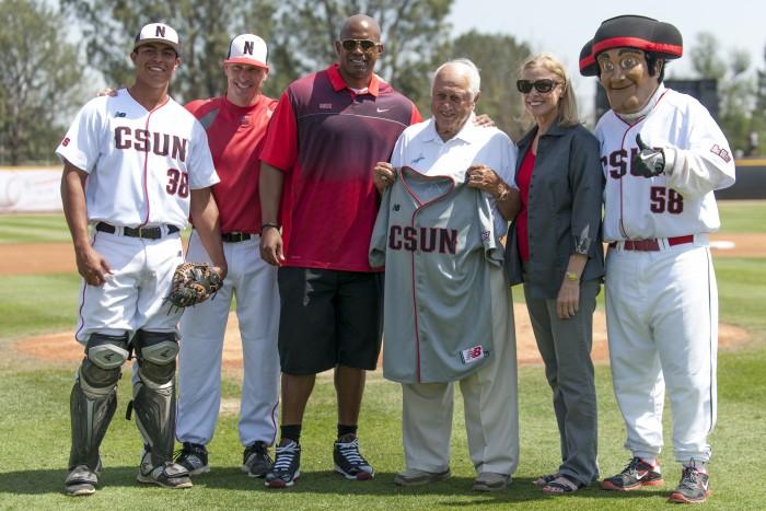 Los Angeles Dodgers former manager Tommy Lasorda (holding jersey) was in attendance at Matador Field signing autographs for his new book and watching CSUN take on 13th ranked UCSB. (Photo credit: BHEphotos)