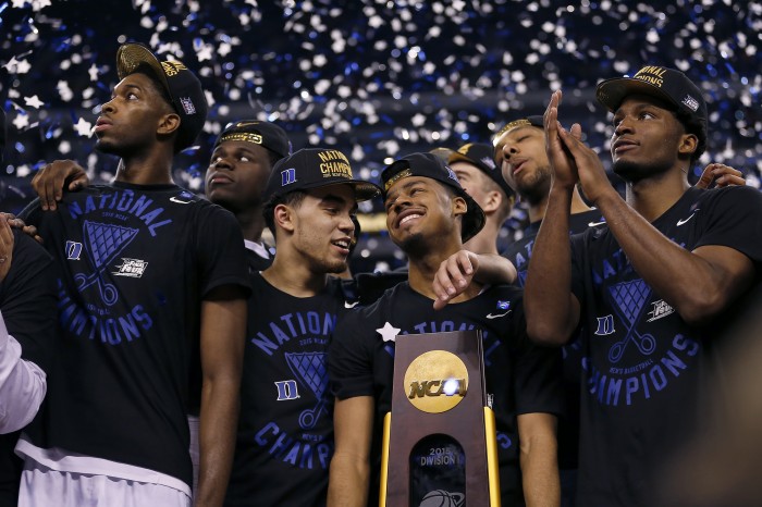 Duke+Blue+Devils+guard+Tyus+Jones+%285%29%2C+center%2C+and+his+teammates+celebrate+their+68-63+win+over+Wisconsin+in+the+NCAA+National+Championship+game+on+Monday%2C+April+6%2C+2015%2C+at+Lucas+Oil+Stadium+in+Indianapolis.+%28Sam+Riche%2FTNS%29