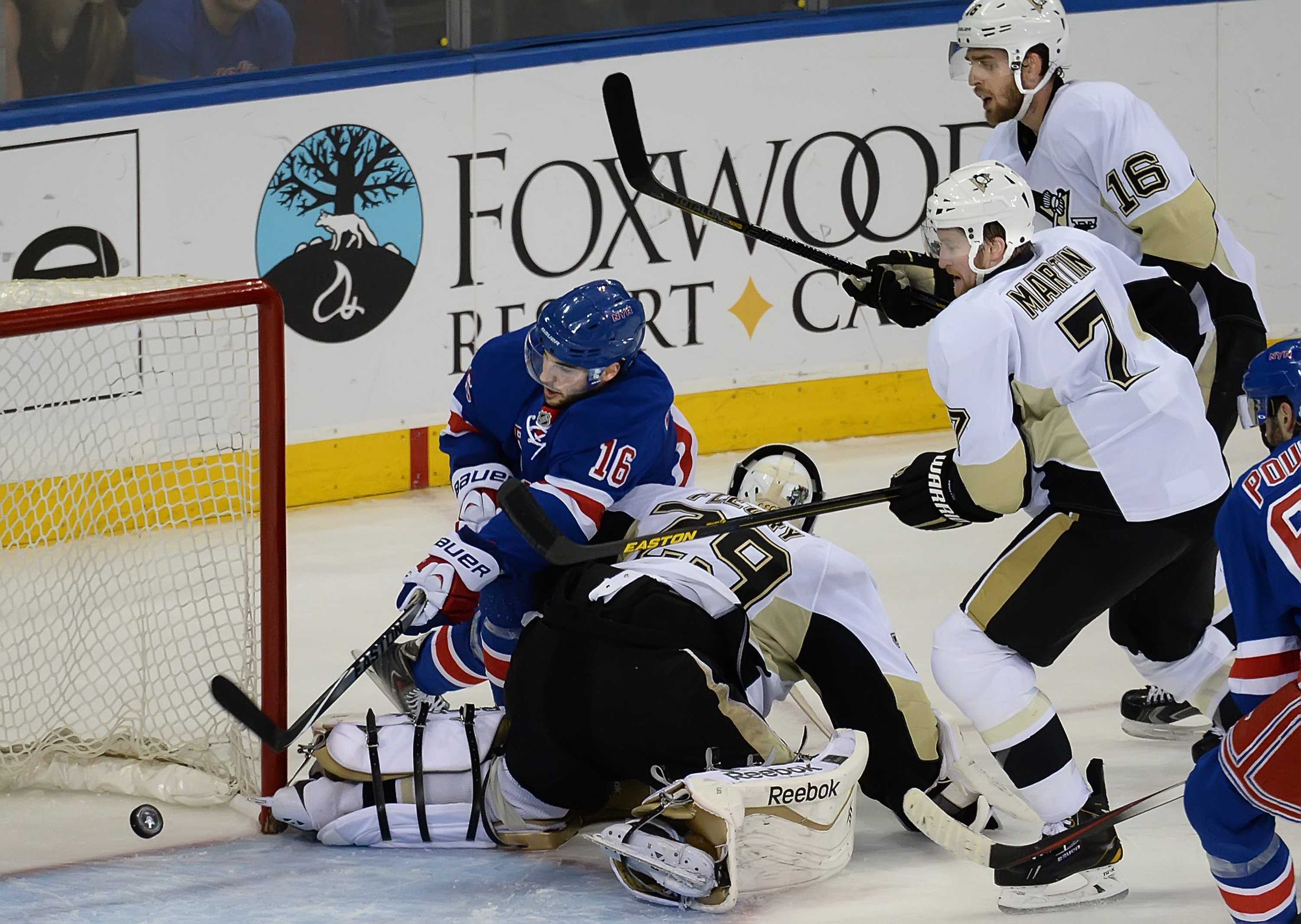 Derick Brassard of the New York Rangers pushes the puck over the goal line behind Pittsburgh Penguins goaltender Marc-Andre Fleury. The Rangers defeated the Penguins, 3-1, in Game 6 of the NHL Eastern Conference playoffs at Madison Square Garden in New York in last years NHL playoffs on Sunday, May 11, 2014. (Peter Diana/Pittsburgh Post-Gazette/MCT)