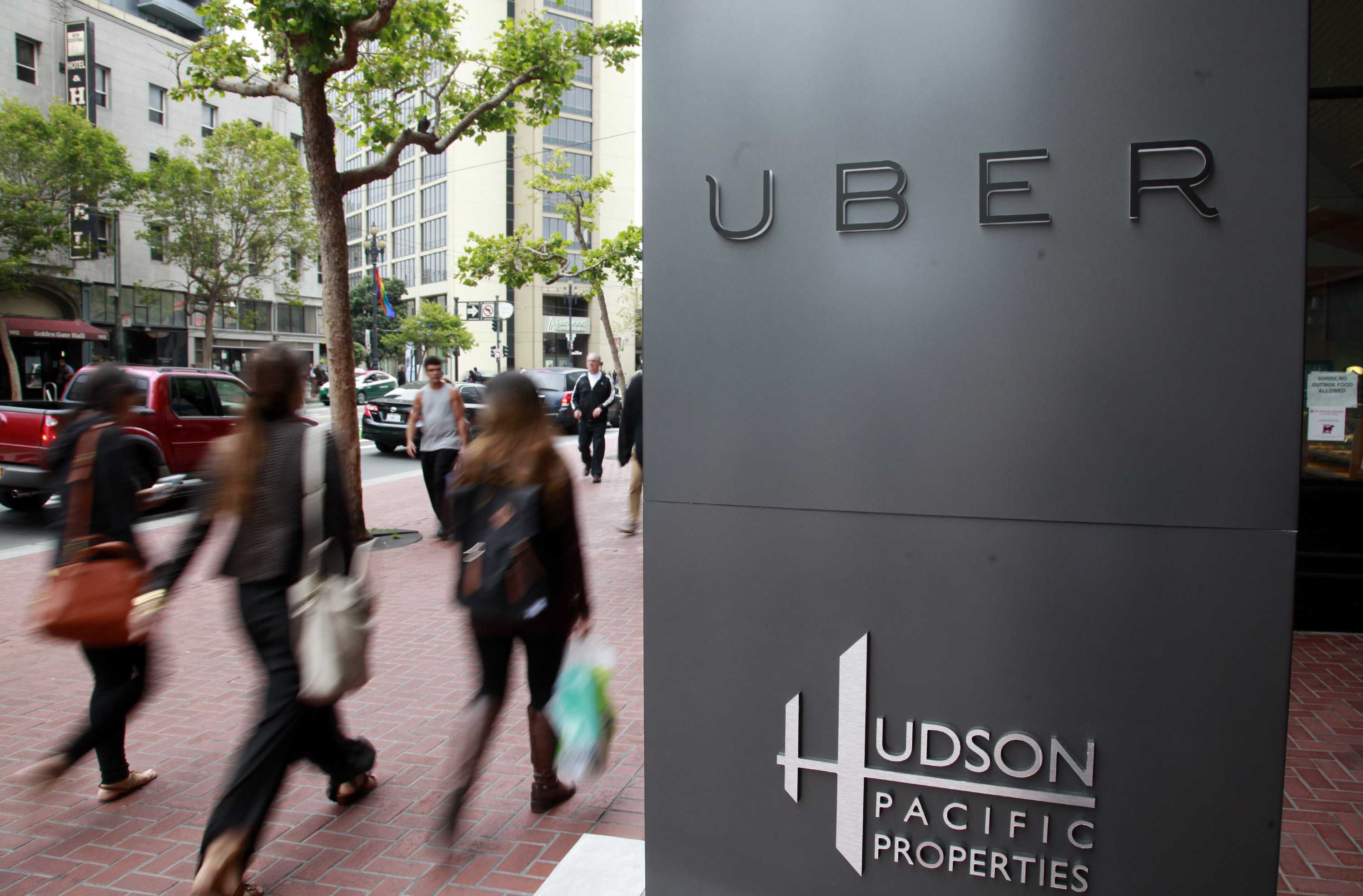 Foot traffic streams past Uber offices on Market Street Monday evening, June 2, 2014 in San Francisco, Calif. The urban tech boom is transforming much the long-blighted mid-Market area. (Karl Mondon/Bay Area News Group/TNS)
