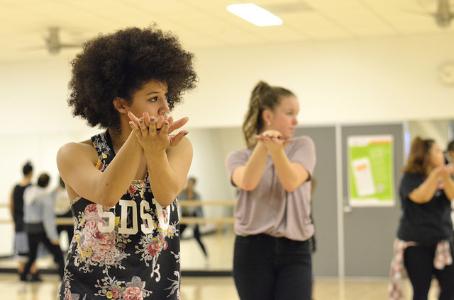 Namiko Knight, 21, senior kinesiology major, performs a dance movement during practice for the CSUN Hip-Hop Club on Wednesday, Nov. 5, 2014 in the Motivation Studio at the SRC. Photo credit: File Photo/The Sundial