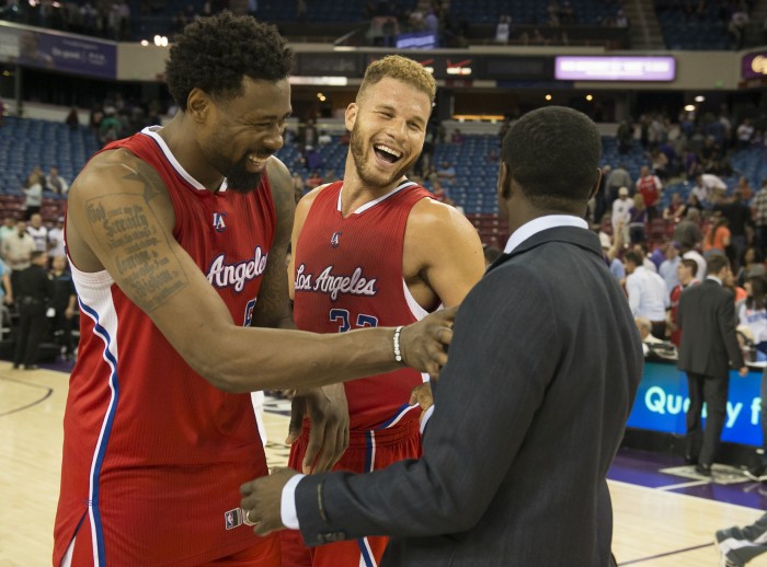 The Los Angeles Clippers DeAndre Jordan, left, and Blake Griffin meet with the Sacramento Kings Darren Collison following the Clippers 116-105 win on Wednesday, March 18, 2015, at Sleep Train Arena in Sacramento, Calif. (Jose Luis Villegas/Sacramento Bee/TNS)
