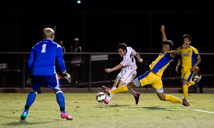 David Turcio dribbles the ball between two Roadrunner defenders and shots in the 0-0 tie at Matador Soccer field on Sunday, Sept. 13. David Hawkins/ The Sundial