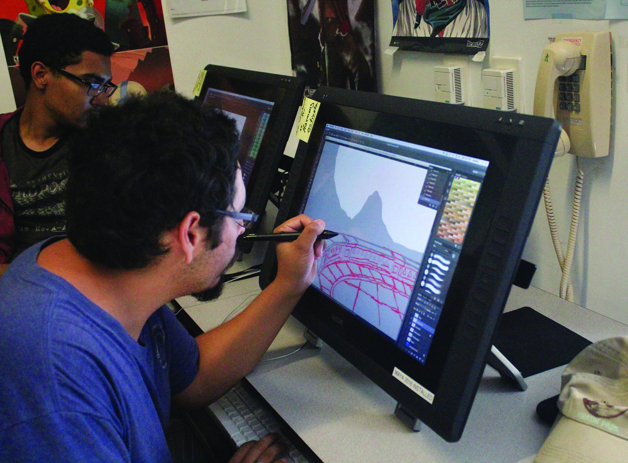 Animation students do some work shwoing how the workflow has changed as technology advances and the