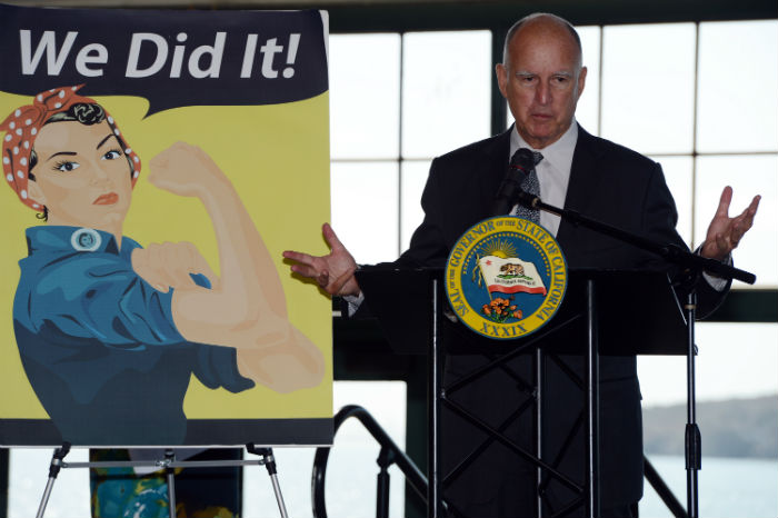 Gov. Jerry Brown addresses the audience as he visits the Rosie the Riveter National Monument to sign the equal pay act into law on Tuesday, Oct. 6, 2015, in Richmond, Calif. (Kristopher Skinner/Bay Area News Group/TNS)