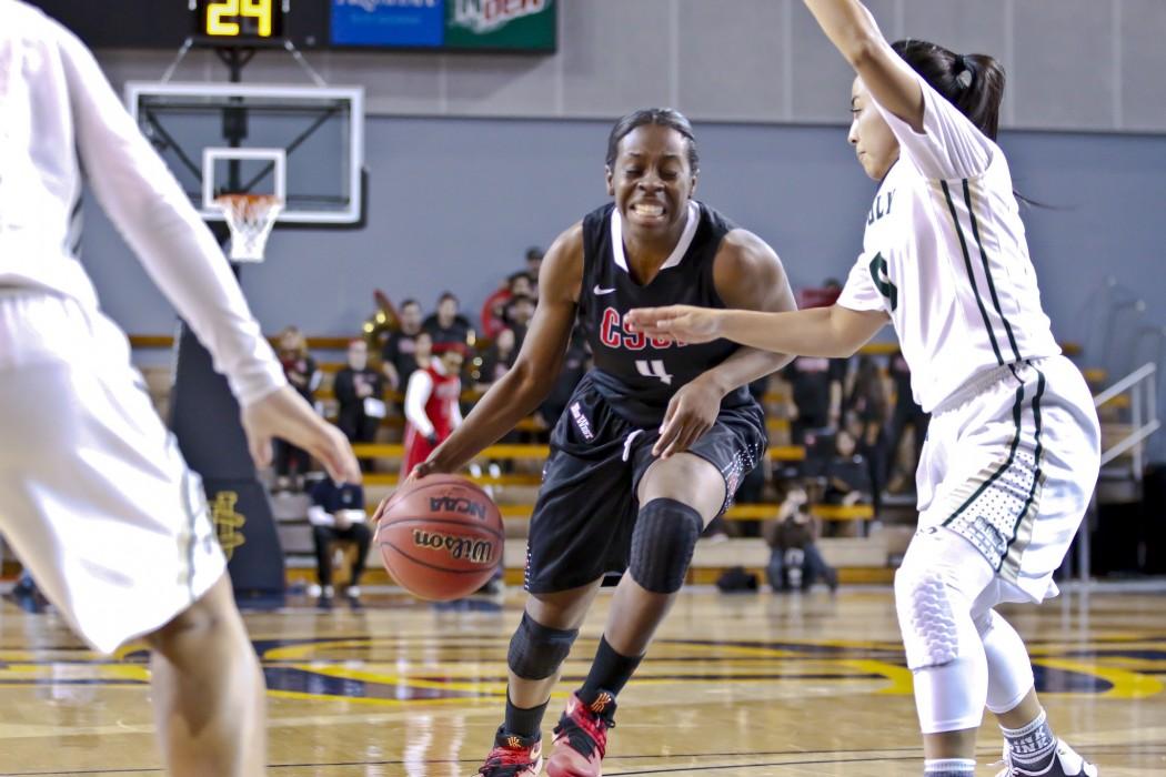 Freshman guard Nautica Morrow attempts to dribble past her defender against the Cal Poly Mustangs on Tuesday, March 8, 2016. The Matadors would lose 72-51 during the first round of the Big West Tournament at the Bren Center in Irvine, California. Photo credit: David Hawkins