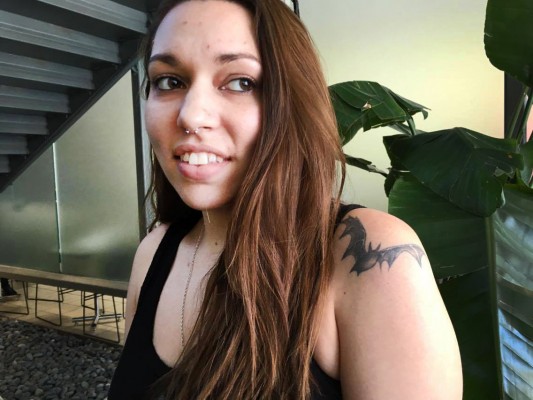 Brittany Huerta shows off bat tattoo