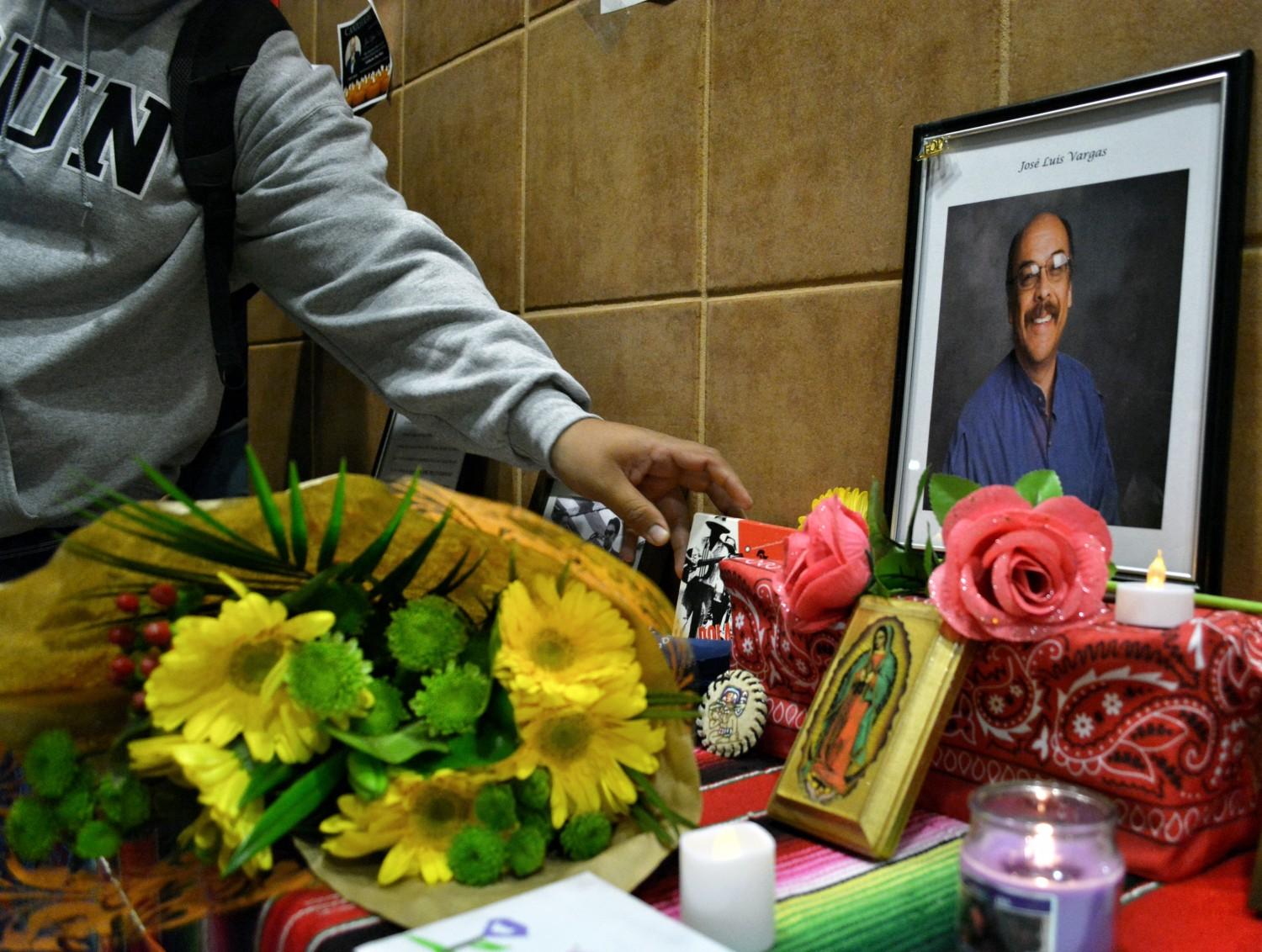 An altar setup at University Hall was left flowers, candles, photos, drawings, bandanas, a smudge stick, a CD of Chicano ballads and other items that reflect memories of José Luis Vargas. Patricia Perdomo / The Sundial