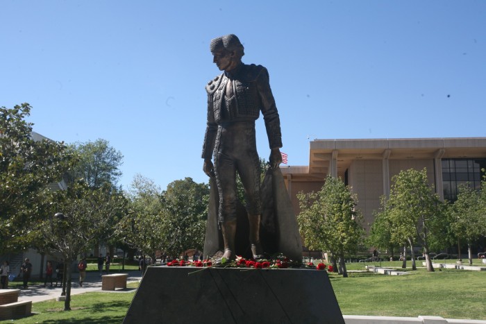 Granada Hills High school students placed flowers on the Matador statue. (Ellen Choi/ Sundial)