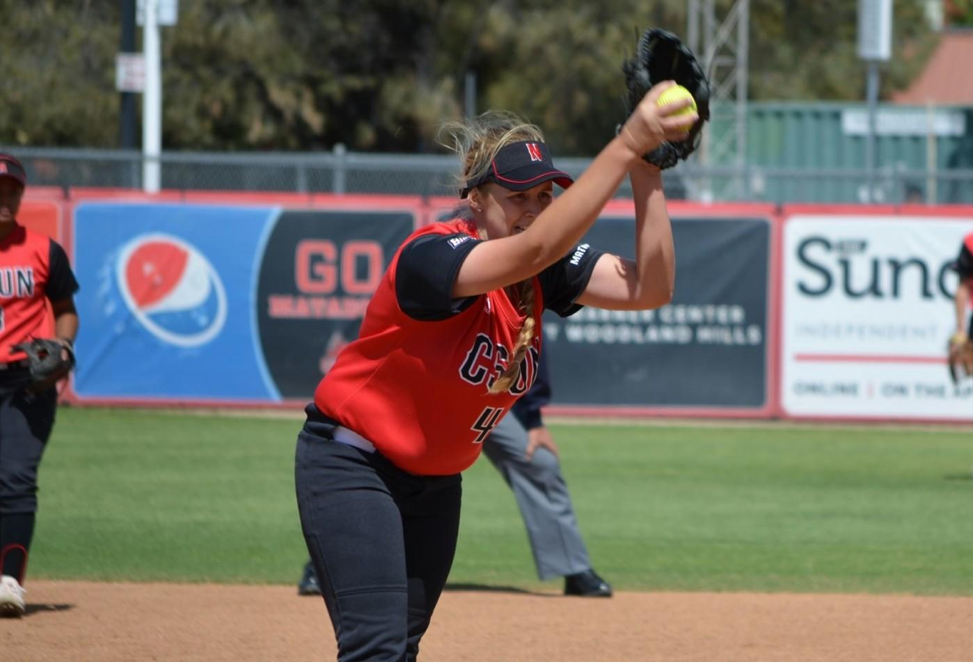 Freshman pitcher Taylor Troost, winds up for her next pitch. (Anthony Martinez/The Sundial)