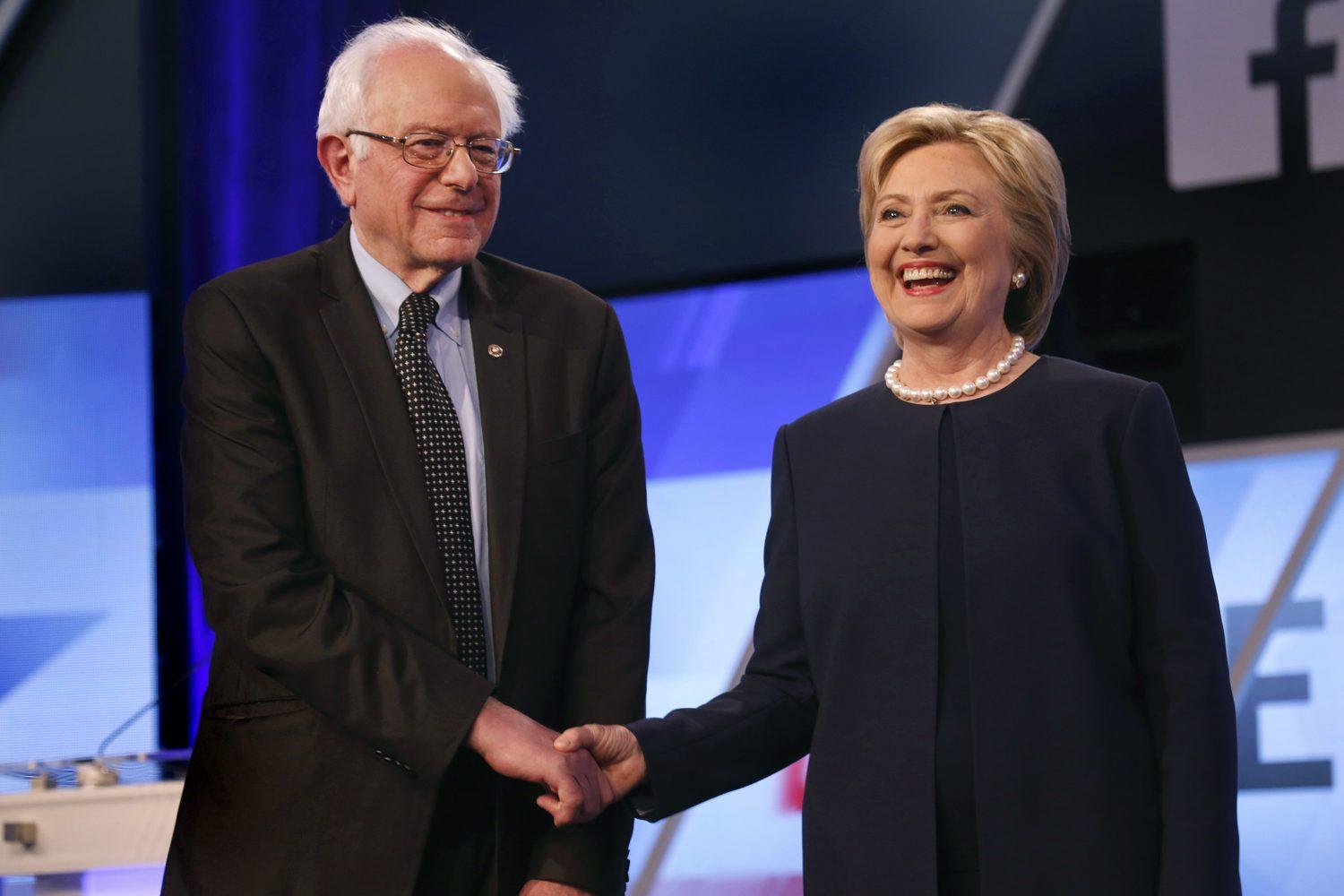 Bernie Sanders and Hillary Clinton shake hands