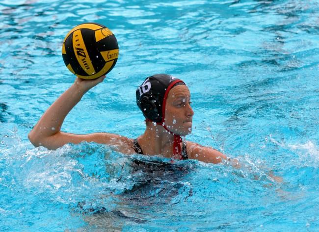 CSUN junior Emily Fuller passes the ball over to her teammates in Matadors game against UC Davis Addies Sunday afternoon. (Patricia Perdomo / The Sundial)