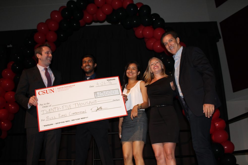 The vibe probiotic team poses with $25,000 dollar check