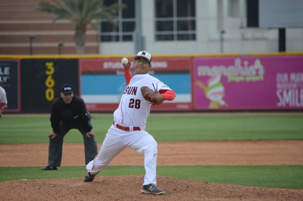 Right handed pitcher Angel Rodriguez winds up a pitch to a Long Beach State batter during their double header evening game at CSUN on Sunday, April 10. Photo credit: Erik Luna