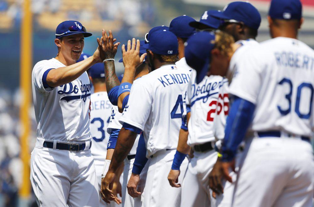 The dodgers high-five each other