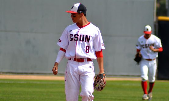 FILE PHOTO - Junior second baseman Fred Smith walks off the field in a game against Northern Colorado University on February 27, 2016. Photo credit: Natalie Jimenez
