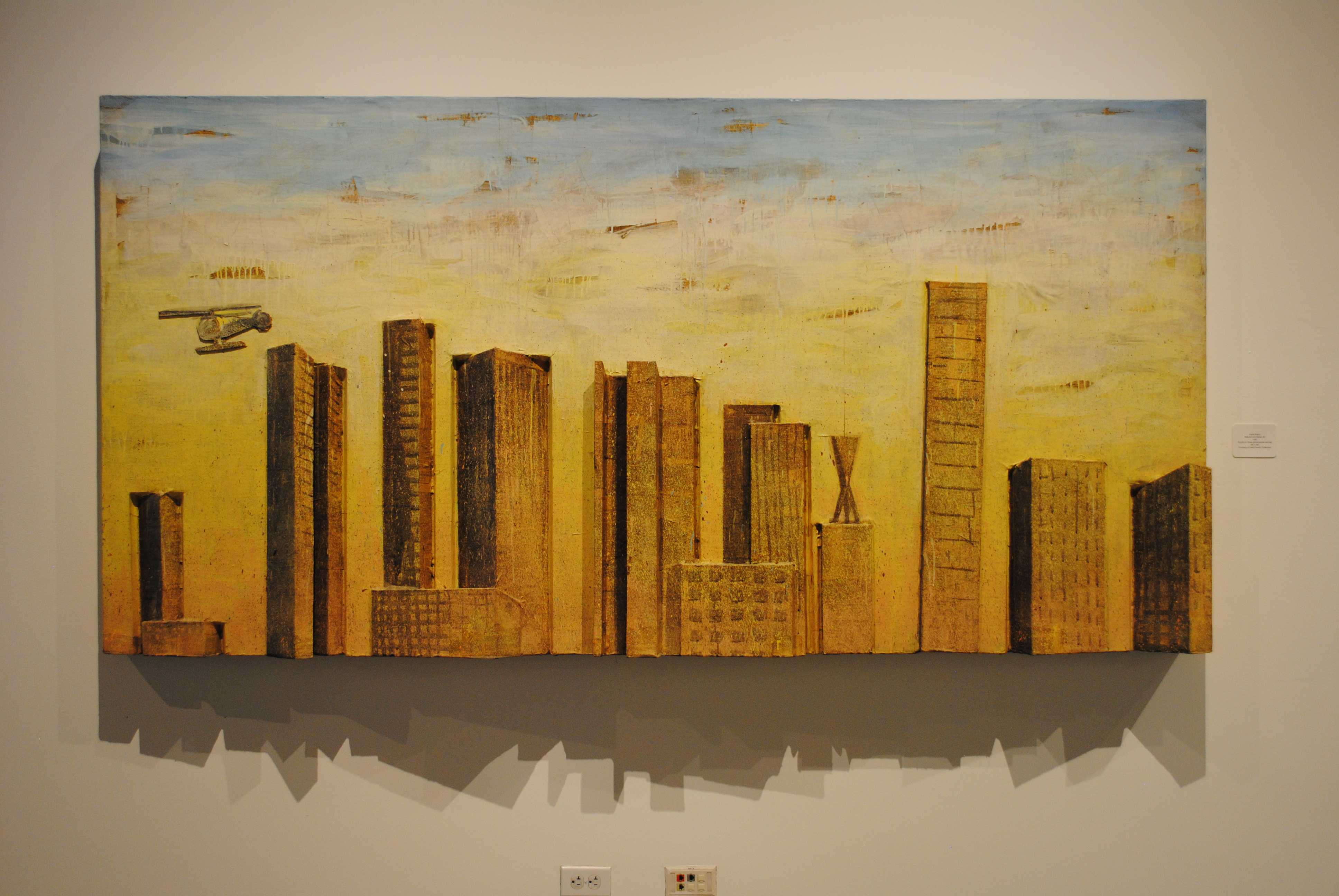 Acrylic painting shows a helicopter flying over buildings