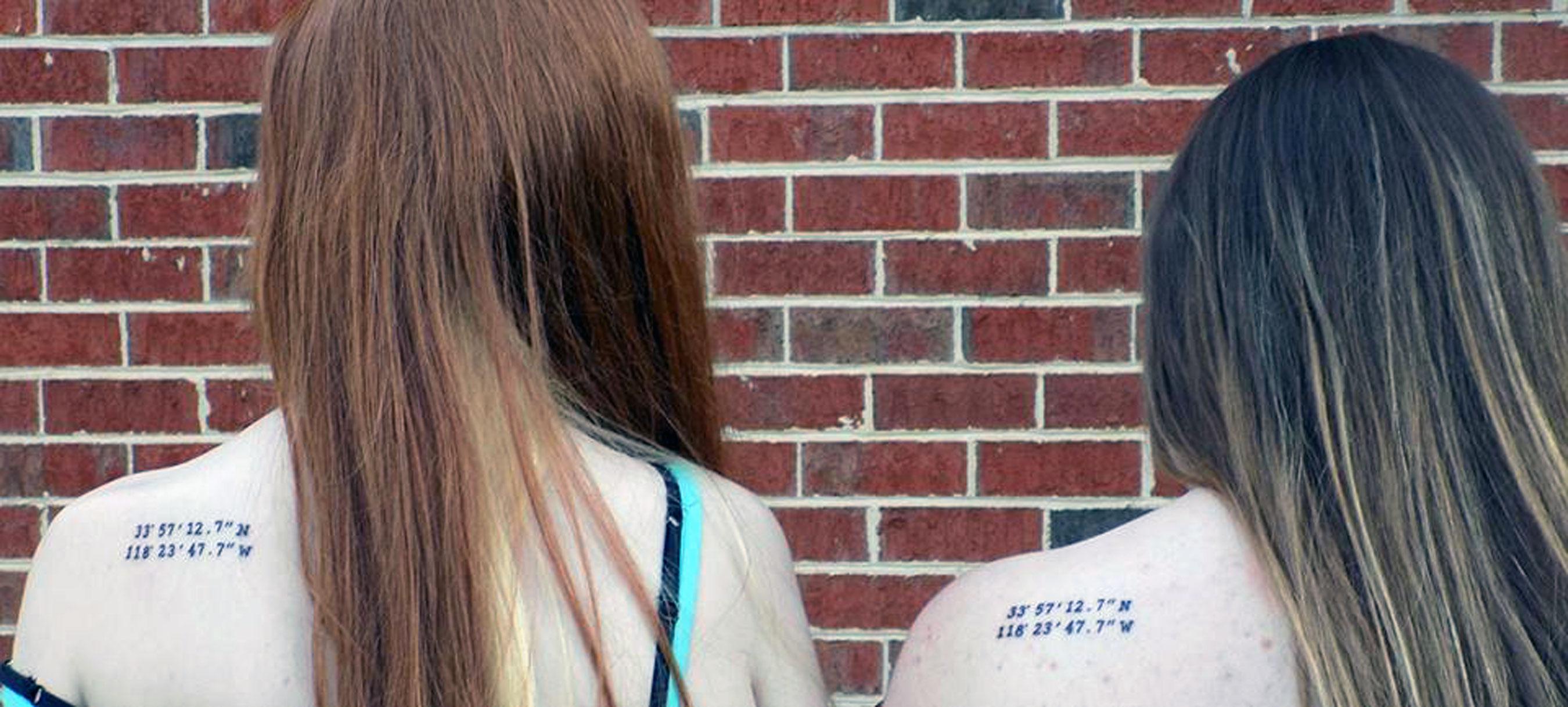 Two women pictured with coordinates pictured tattooed on their shoulder blades