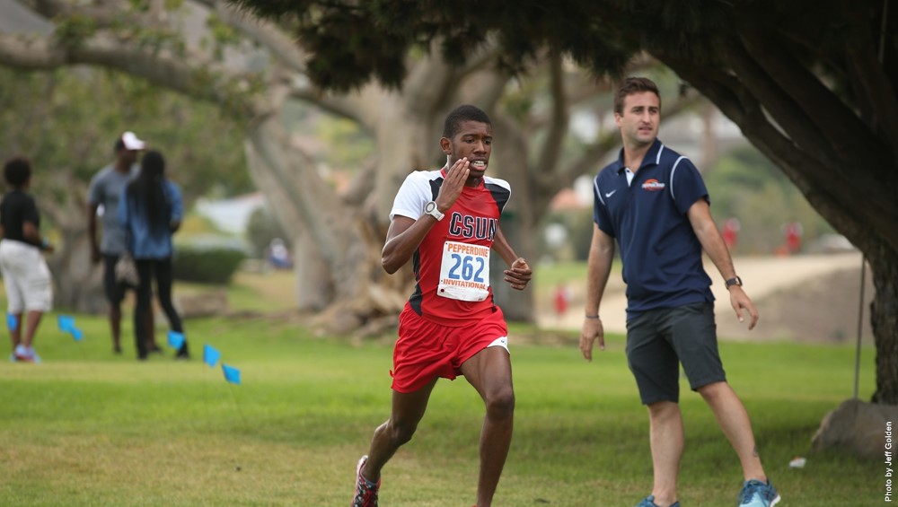 Cross country runner competes at a meet