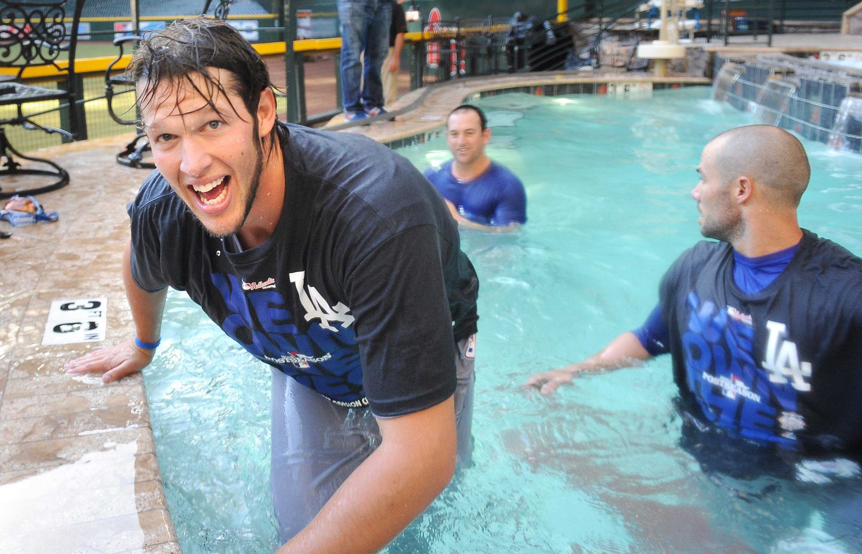 Dodgers players hangout in a pool
