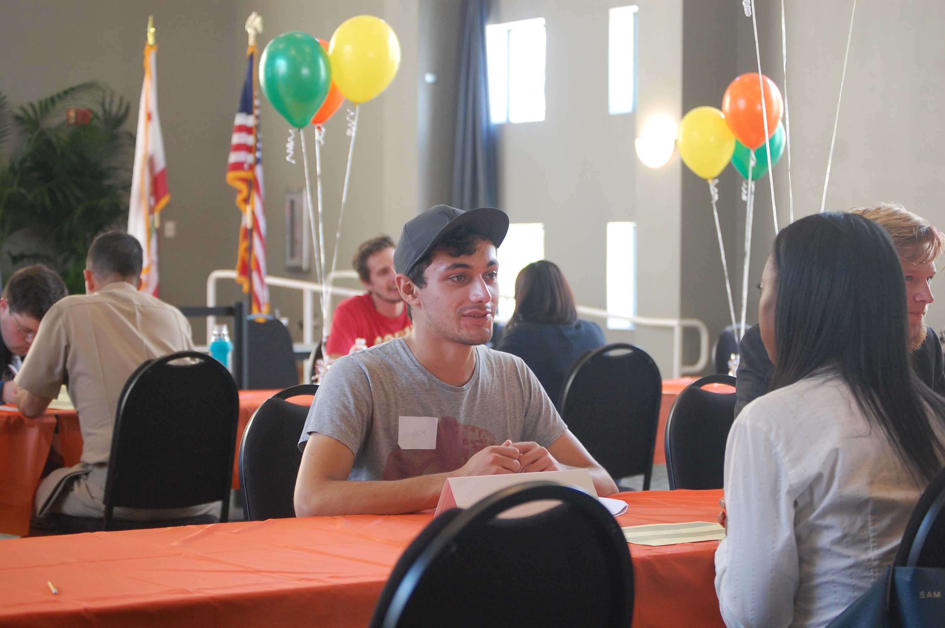 Jonathon Bassey gets critiqued by an employer on his interview skills, October 11, 2016 at The Grand Salon, CSUN. Bassey was one of many students to take advantage of the skills workshop. (Max Zeronian/The Sundial) Photo credit: Max Zeronian