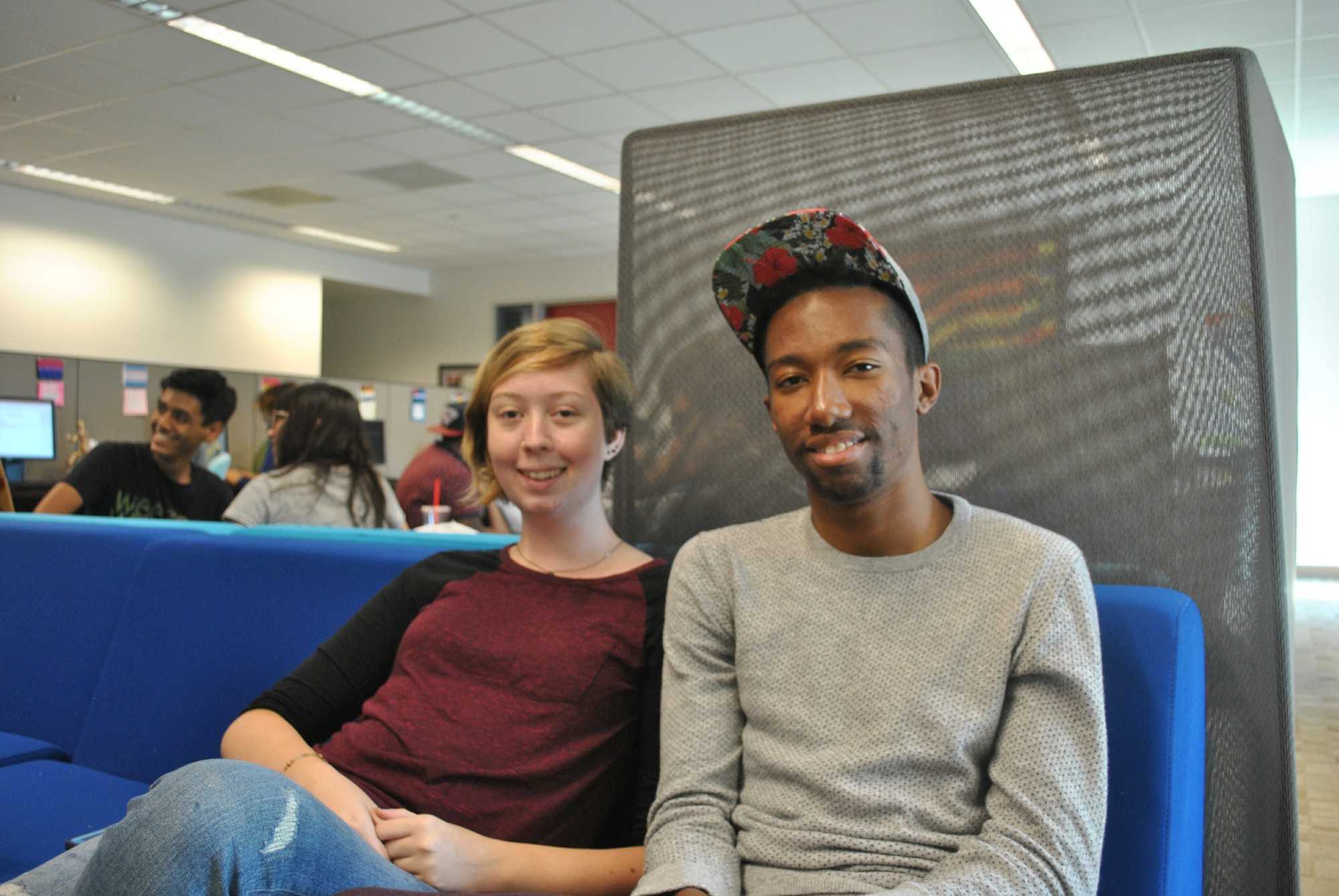 Two students shown in the pride center