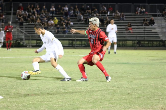 Juan Fernando Samayoa attempts to steal the ball from UC Davis. Photo Credit: Evelyn Hernandez