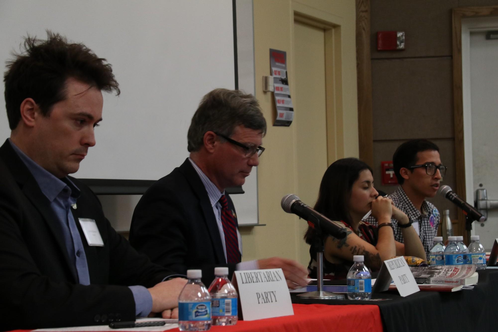 (From left to right)Joshua Glawson, Howard Hyde, Xochitl Medrano and Angel Rolland debate on their parties stances and policies. Each represented a particular party, Libertarian, republican, Democrat and green parties respectively.
