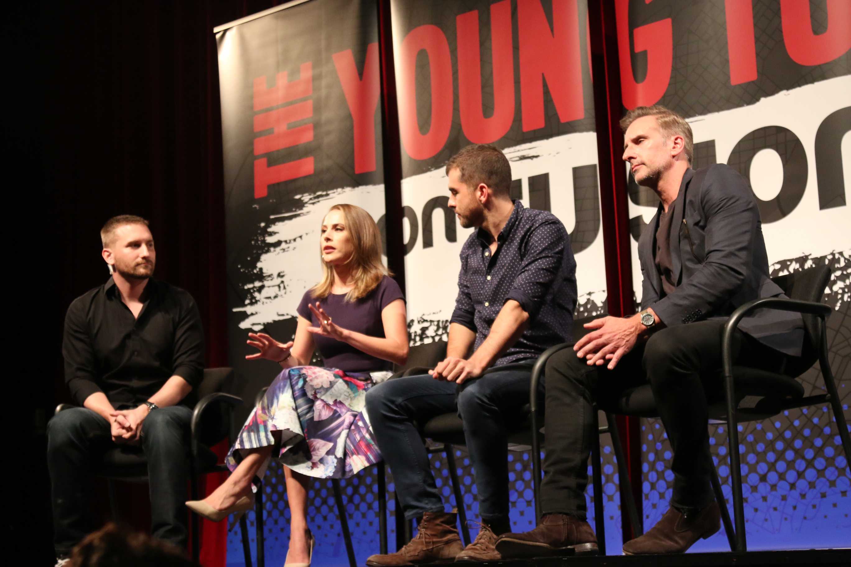 Photo shows four members of the Young Turks seated at a discussion panel