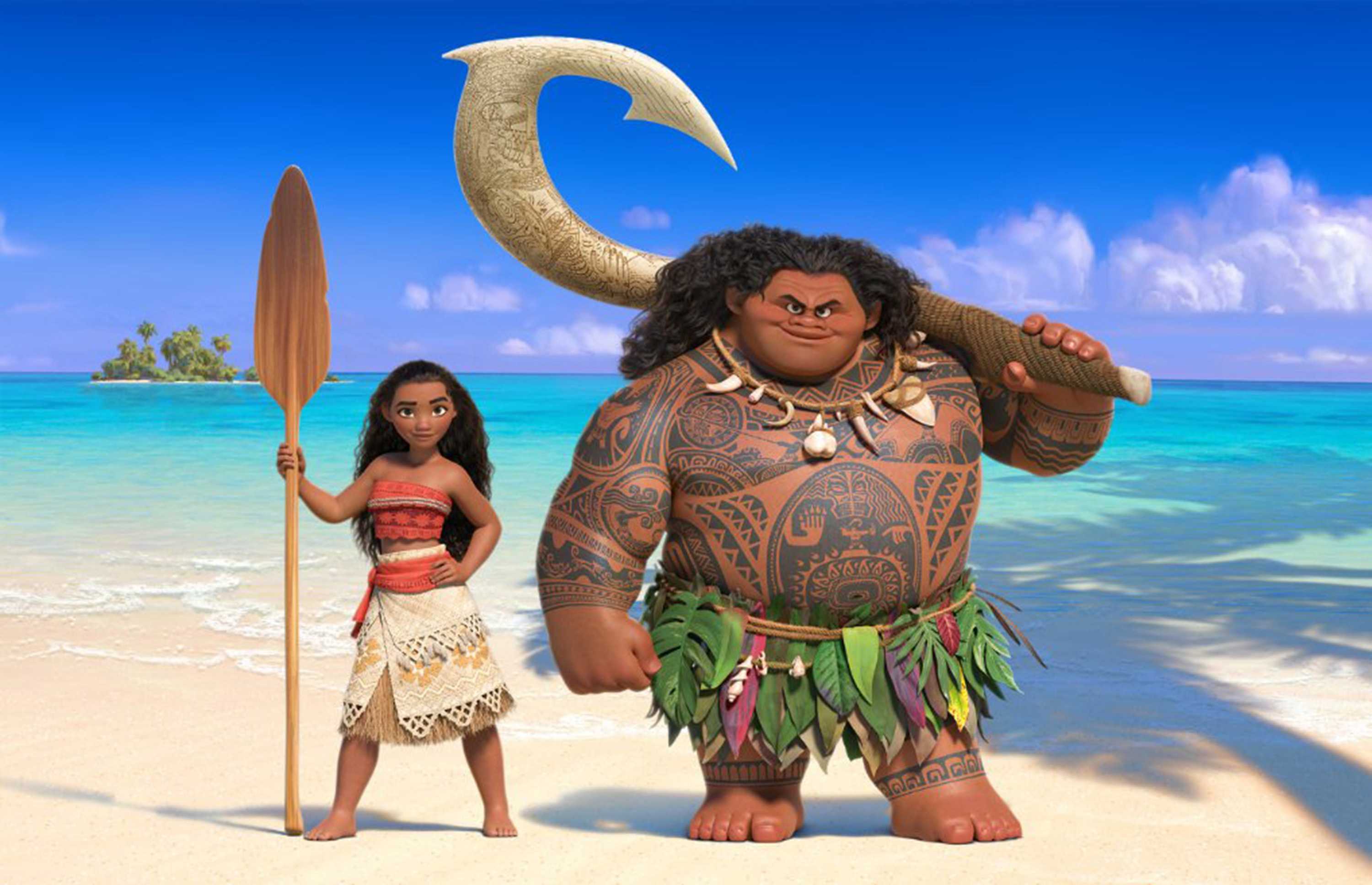 Still from disneys Moana shows the characters Moana and Maui in front of a beautiful beach