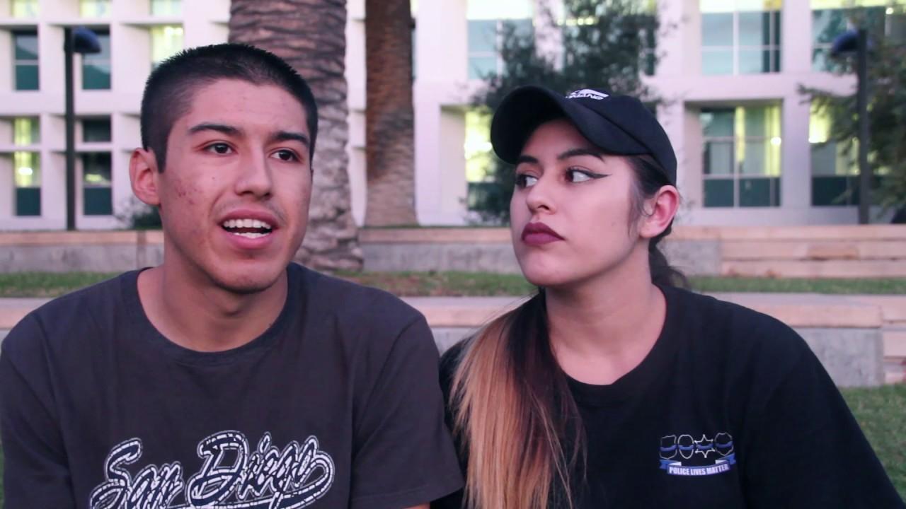 Two students shown sitting on CSUN campus