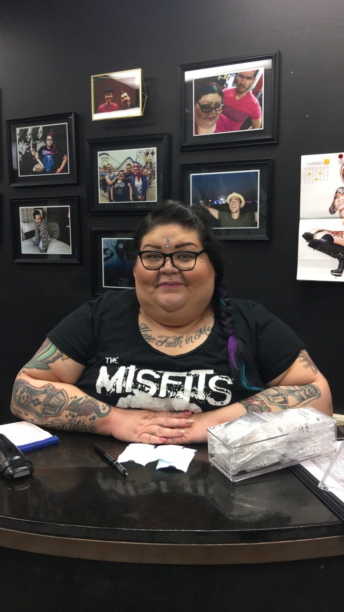 woman pictured at piercing shop