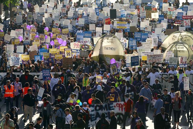 More than 1,000 people from Good Jobs LA, labor unions, unemployed workers, the clergy and Occupy LA marched in Los Angeles, California, during a day of protests against the banks and wealthy coporations, Thursdaym November 17, 2011. (Mark Boster/Los Angeles Times/MCT)