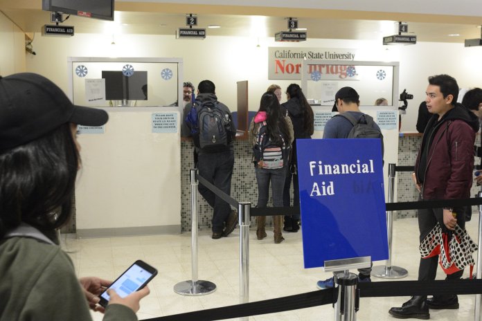 CSUN students pictured lining up at the financial aid office