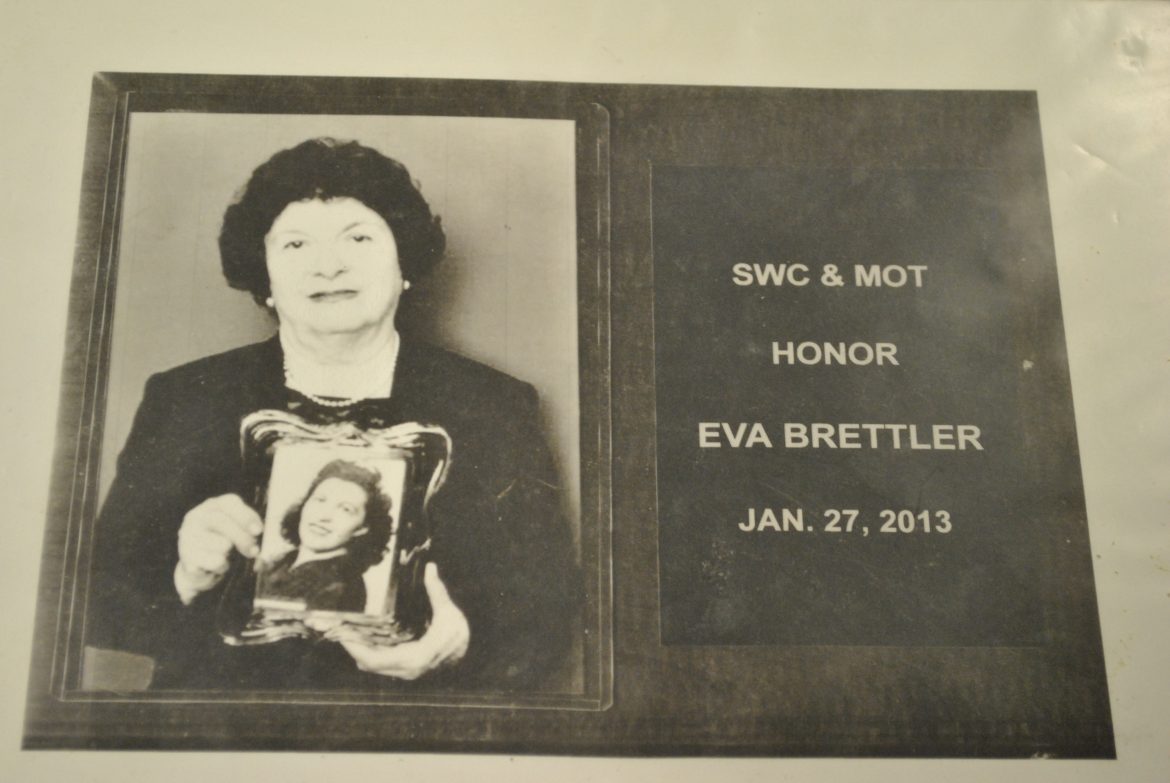 eva pictured holding a photograph of her mother