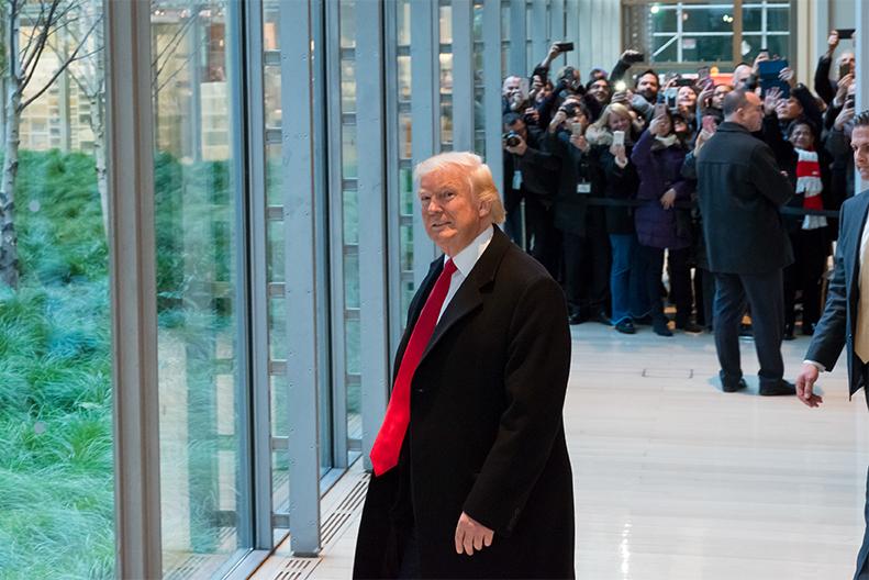Following his meeting with senior staff from the New York Times, President-elect Trump is seen in the lobby of the New York Times' offices on Eighth Avenue in midtown Manhattan in New York on Tuesday, Nov. 22, 2016. (Albin Lohr-Jones/Sipa USA/TNS)