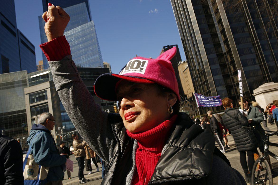 On International Women's Day, about 50 people gather on the edge of Central Park in New York to voice their opposition to the current administration policies. Nancy Pichardo, 67, of New York, says 