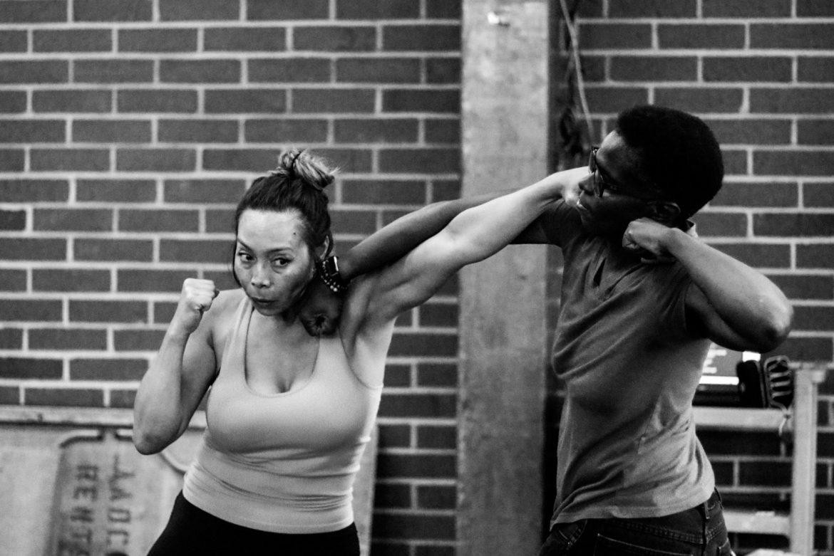 Photo+shows+two+women+practicing+their+punches+on+one+another