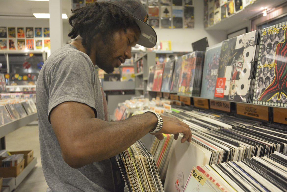 Thomas DaVinci pictured perusing the records in a record store