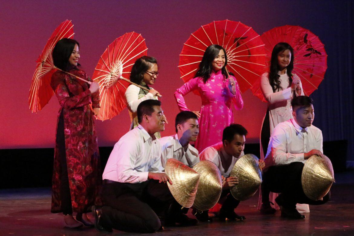 8 students perform a dance together