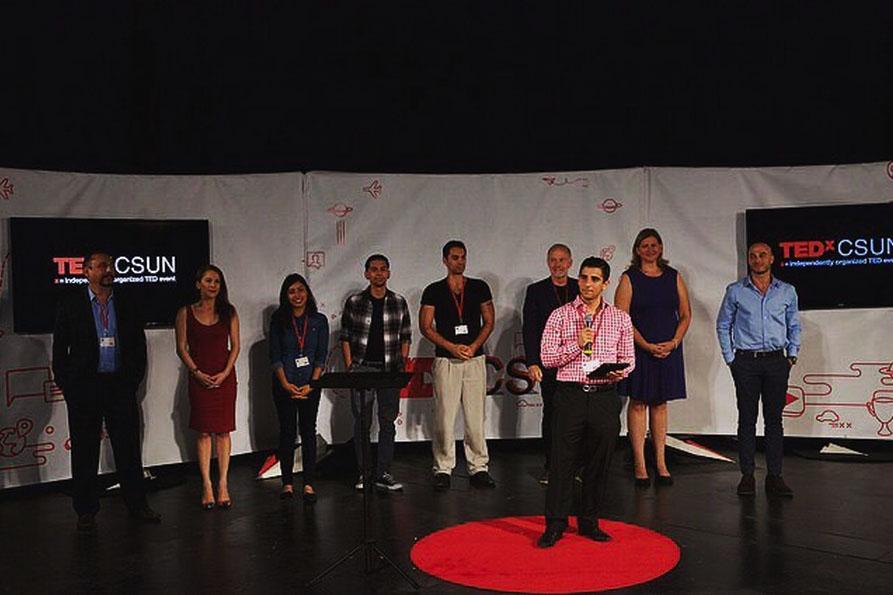 Lucas+pictured+on+stage+presenting+for+Ted+x+CSUN