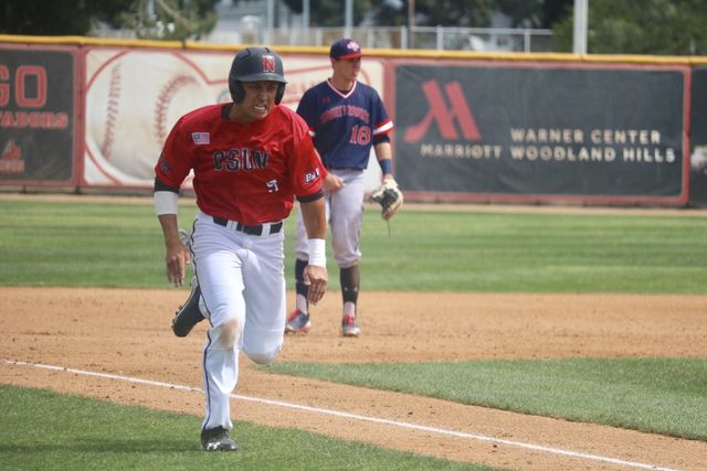CSUN’s junior outfielder, Riley Conlan, runs for home, bringing in the first run for the Matadors on Sunday, March 19, at the Matador Field.