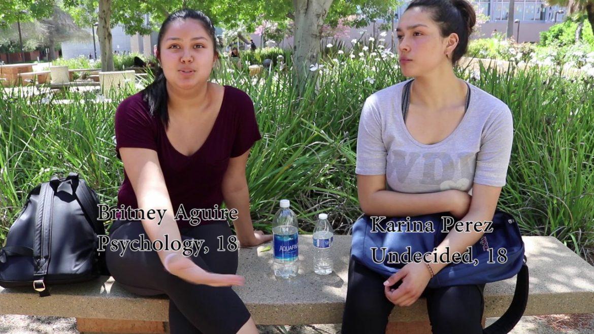 Photo shows Britney Aguire and Karina Perez being interviewed in front of Manzanita hall