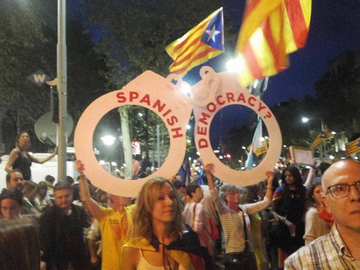 Spanish+and+democracy+being+questioned+on+handcuffs