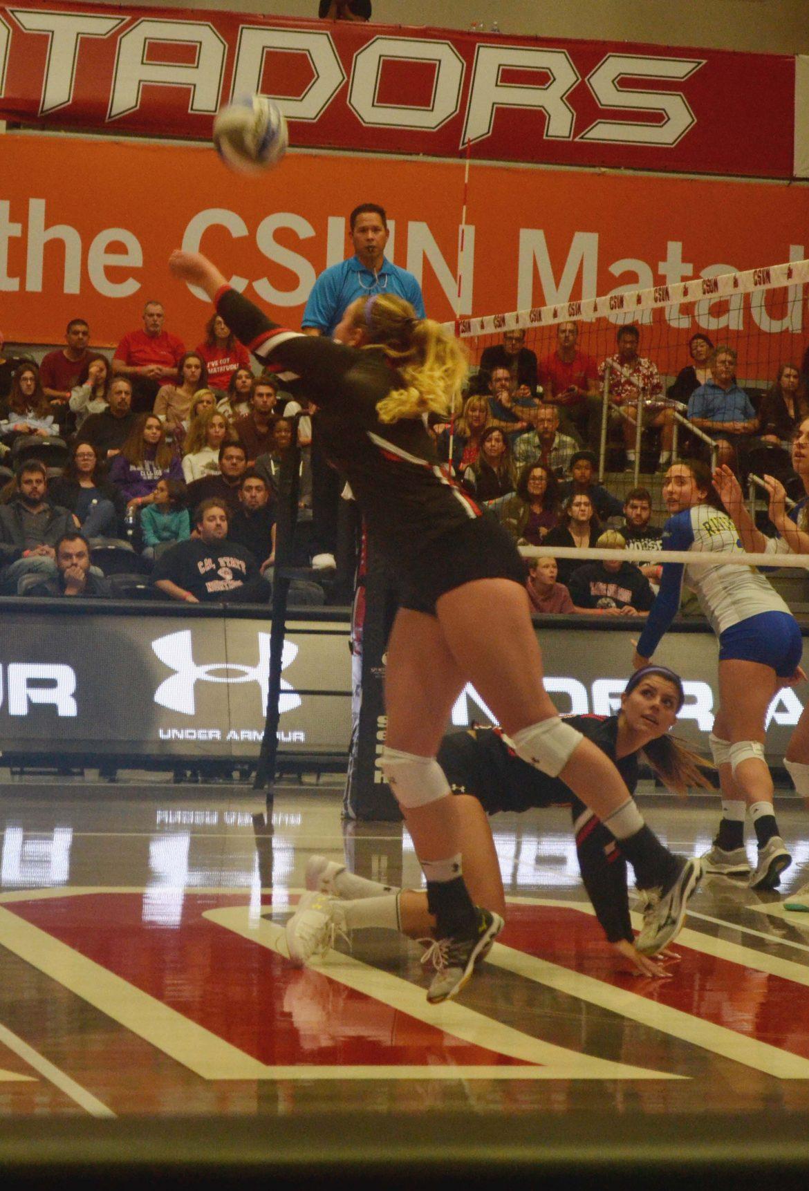 CSUN woman volleyball player in action hitting a ball
