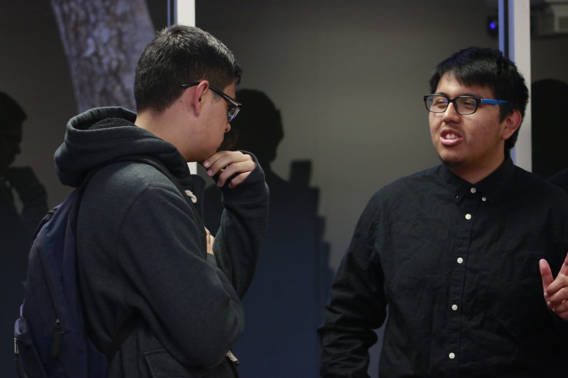 Miguel Guerrero, 18, an Electrical Engineering major (right) and Jeremy Perez (left), 20, an Computer Engineering major, conversing before an event held by the Society of Hispanic Professional Engineers.

Guerrero said afterwards that it was good to see 