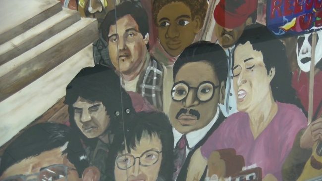 mural with protesters