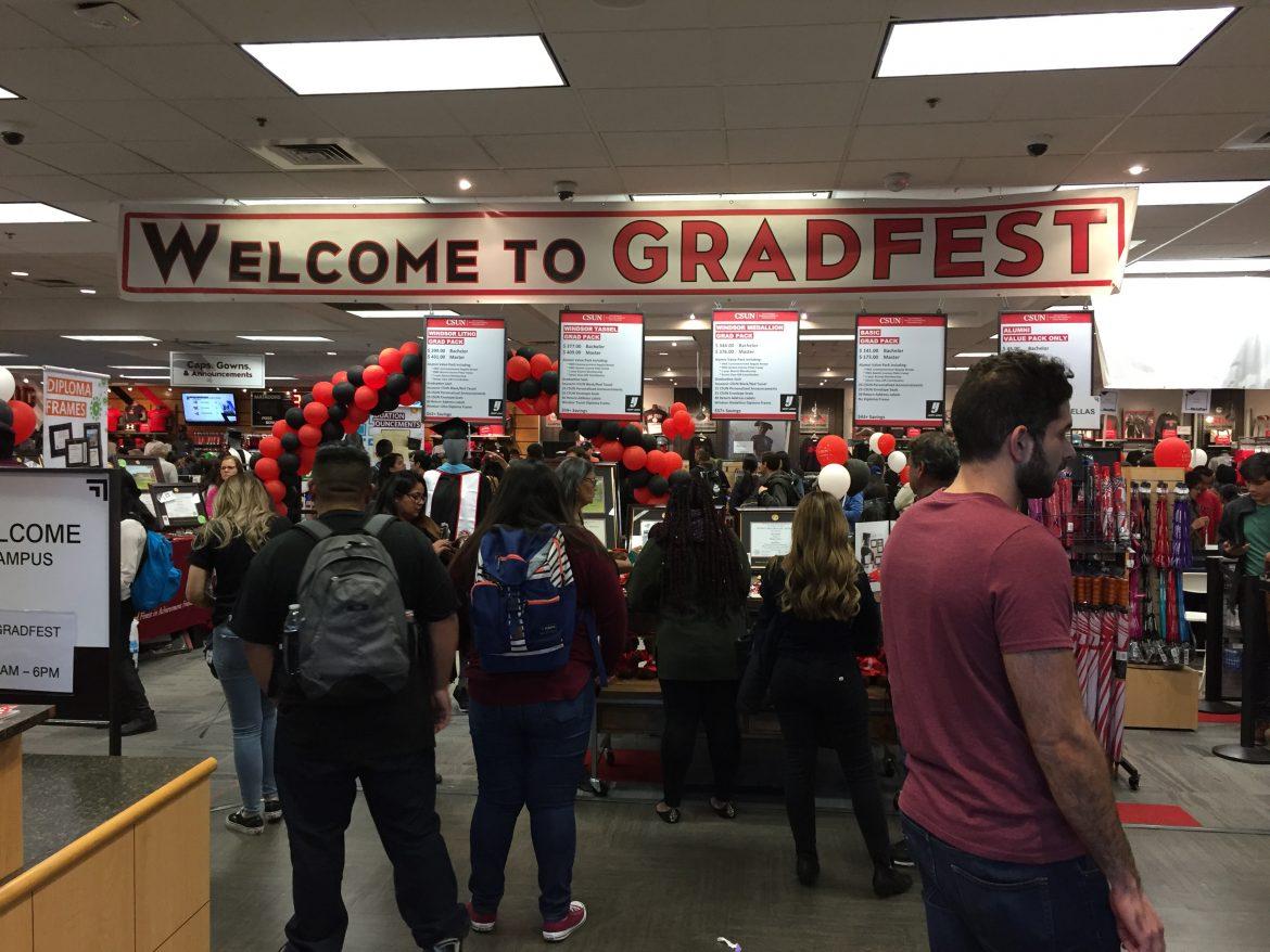 red and black banner inside bookstore reading Welcome to Gradfest
